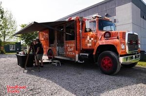 Ford 28' Wood-Fired Brick Oven Pizza Truck / Head-Turning Mobile Pizzeria