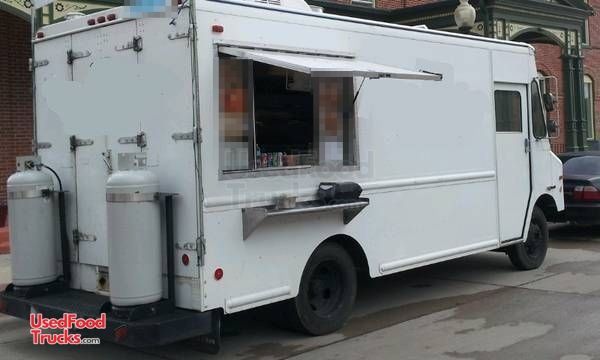 Used 14' Chevrolet P30 Step Van Kitchen Food Truck / Mobile Food Unit.