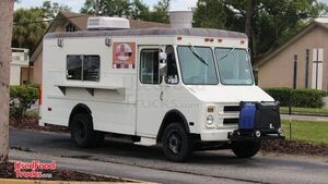 Ready to Serve 19.8' Chevrolet P30 Permitted Mobile Kitchen Food Truck.