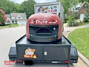 Marra Forni Wood-Fired Pizza Oven Trailer with 2014 12' Chevy Box Truck.