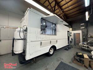 Fully-Equipped Chevy P30 Step Van Kitchen Food Truck with Newly-Built Kitchen.