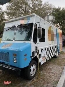 2001 - 30' Workhorse P42 Kitchen Food Truck with a BBQ Smoker on a Trailer.
